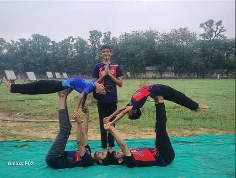 Students playing cricket